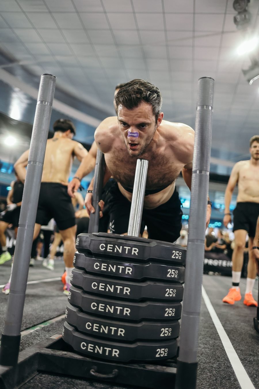 Sled push at a HYROX event